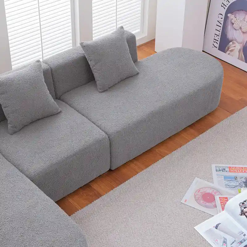 Canapé d'angle moderne en bouclette avec assise incurvée (orientée à gauche)