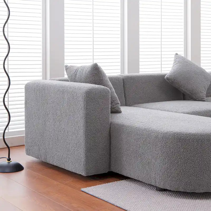 Canapé d'angle moderne en bouclette avec assise incurvée (orientée à gauche)