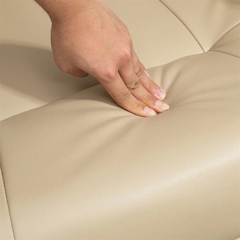 Fauteuil inclinable manuel en cuir pivotant avec accoudoirs et repose-pieds extensible